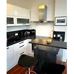 Kapitänsapartment Villa Käthe Kurpark - stilvolle 65qm Ferienwohnung nahe Strand